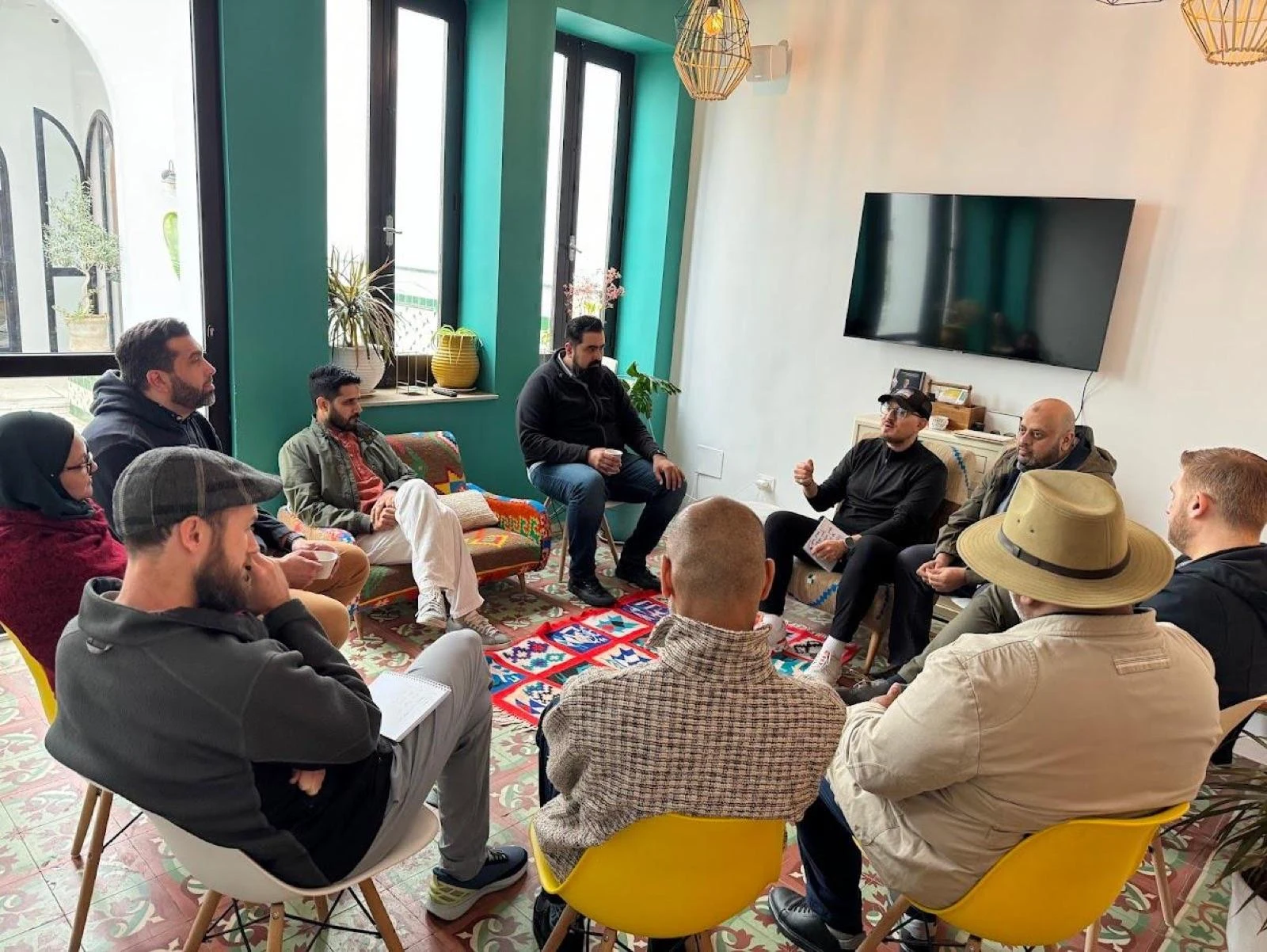 Group seated in a circle during a facilitated retreat discussion